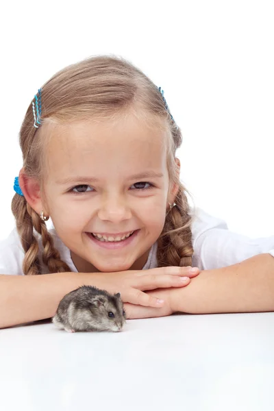 Little girl and her hamster — Stock Photo, Image