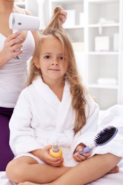 Drying hair after bath clipart