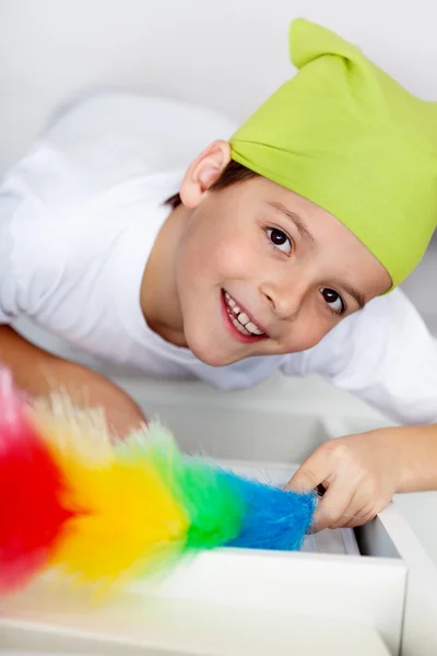 Dusting - boy cleaning his room — Stock Photo, Image