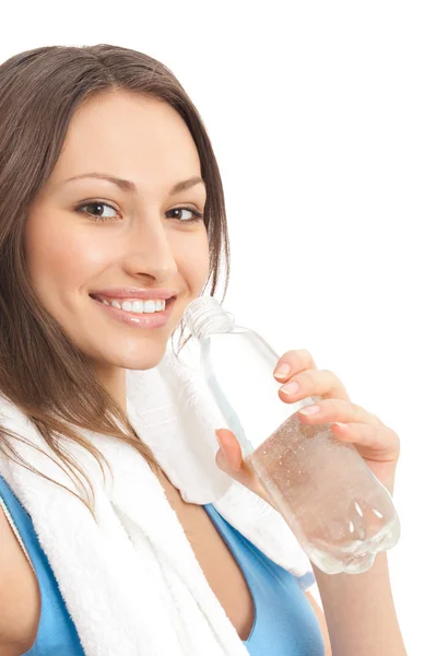 Vrouw in fitness slijtage met water, geïsoleerd — Stockfoto