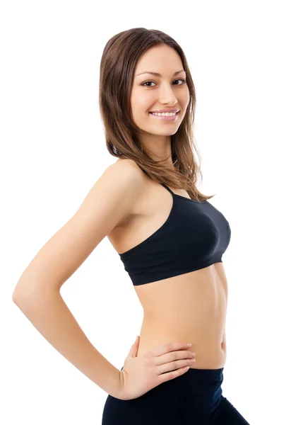 Smiling woman in fitness wear, isolated — Stock Photo, Image