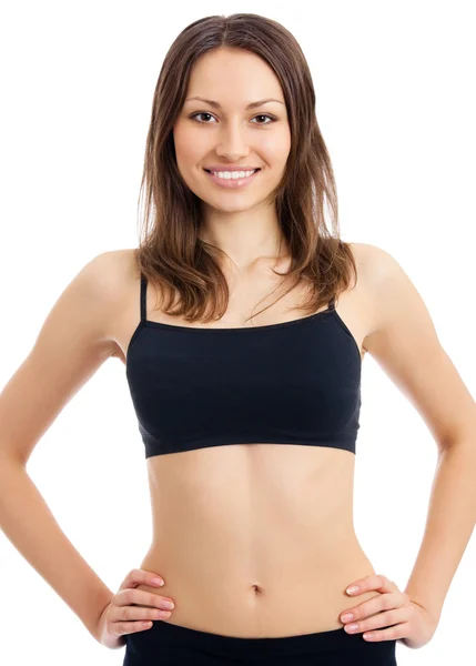 Lächelnde Frau in Fitnessbekleidung, isoliert — Stockfoto