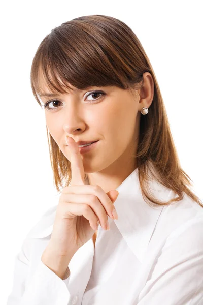 Mulher de negócios mantendo o dedo em seus lábios, isolado — Fotografia de Stock