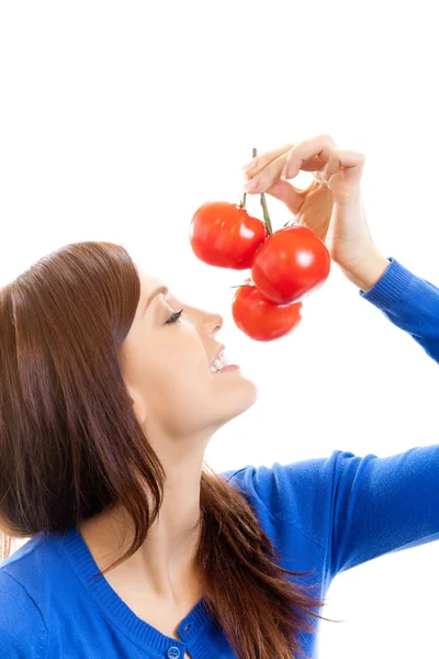 Usmívající se žena s rajčaty, izolované na bílém — Stock fotografie