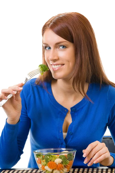 Young woman eating vegetarian salad with broccoli, isolated on w — Stock Photo, Image