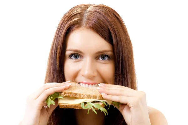 Velmi hladový nenasytný žena jíst sendvič — Stock fotografie