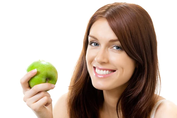 Молода усміхнена жінка з яблуком, ізольована на білому — стокове фото