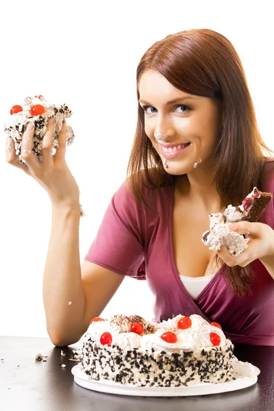Young hungry gluttonous woman eating pie, isolated — Stock Photo, Image