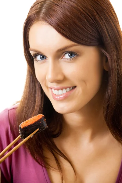 Joven mujer feliz comiendo rollo de sushi por palillos, aislado en w —  Fotos de Stock