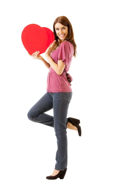 Молодая счастливая улыбающаяся женщина с символом сердца, изолированная — стоковое фото