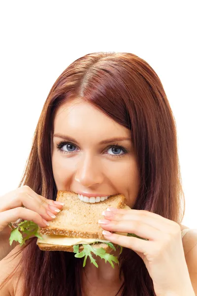 Hungry gluttonous woman eating sandwich with cheese, isolated — Stock Photo, Image