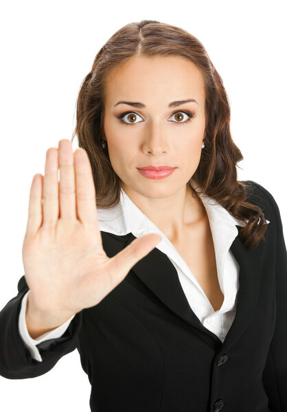 Businesswoman with stop gesture, on white