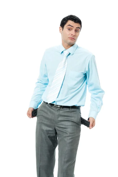 Hombre de negocios infeliz mostrando bolsillos vacíos, aislado — Foto de Stock