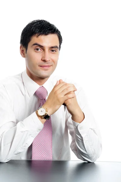 Portrait of young happy smiling business man sitting at table, i — Stock Photo, Image