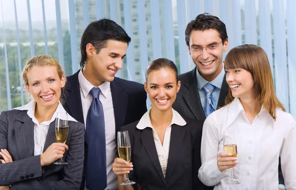 stock image Happy business team celebrating with champagne at office