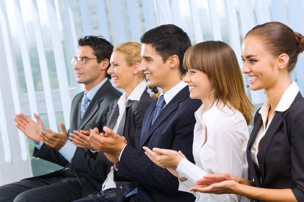 Photo of businesspeople or students at conference — Stock Photo, Image