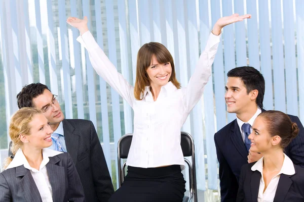 Successful happy businesswoman and businessteam at office — Stock Photo, Image
