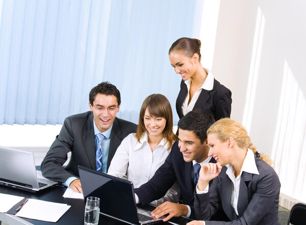 Successful business team working together at office