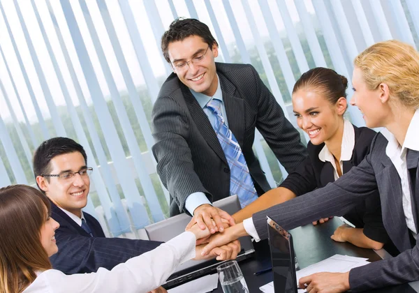 Happy successful gesturing business team at office — Stock Photo, Image