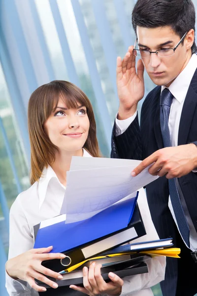 Two businesspeople working with documents at office — Stock Photo, Image