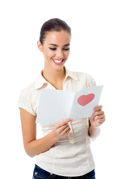 Gelukkig jongedame met valentine card, geïsoleerd — Stockfoto
