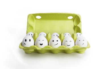 Group of happy eggs with smiling faces representing a social network clipart