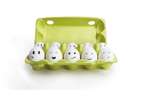 Group of happy eggs with smiling faces representing a social network