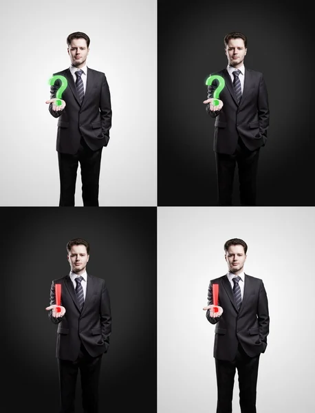 Set of young businessmans with a question and exclamation marks on his hand — Stock Photo, Image