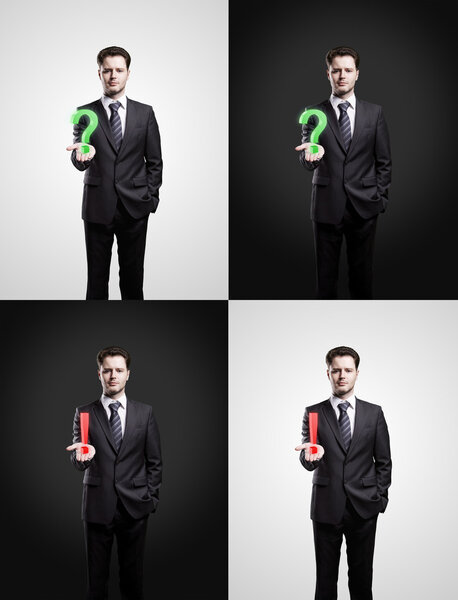 Набор молодых бизнесменов с вопросительными и восклицательными знаками на руке
