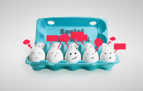 Group of happy smiling eggs with social chat sign and speech bubbles