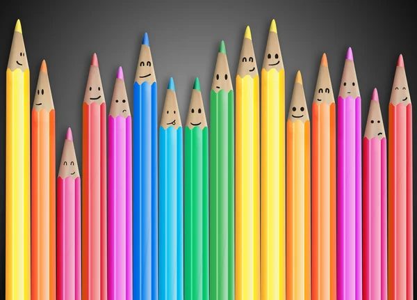 Группа цветных карандашей с улыбающимися лицами, представляющих социальную сеть — стоковое фото