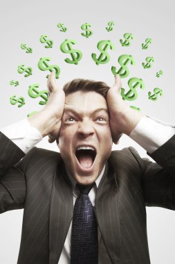 Portrait of a young man shouting loud with green question marks clipart