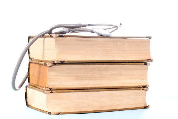 stock image Stethoscope on top of books