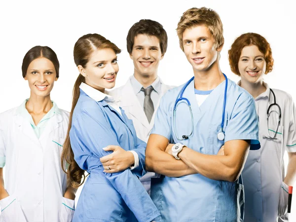 Grupp av leende medicinska på vit bakgrund — Stockfoto