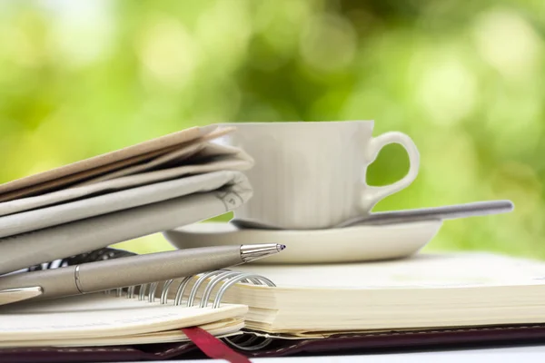 Cup of coffee with office equipment — Stock Photo, Image
