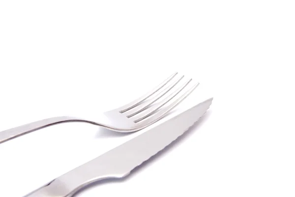 Mes en vork geïsoleerd op witte achtergrond — Stockfoto