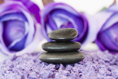 Stones with purple flower