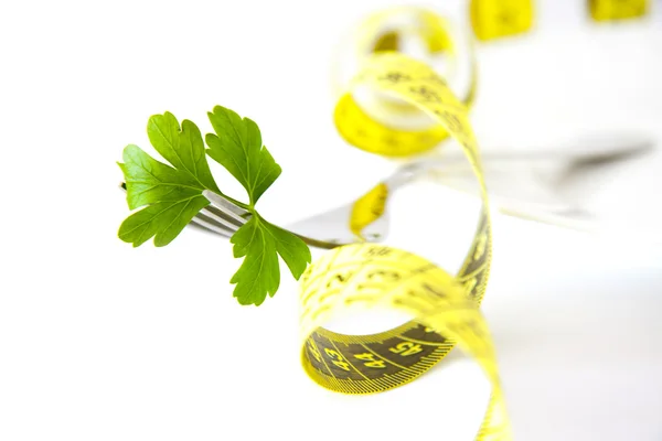 Parsley leaf and measuring tape holder — Stock Photo, Image