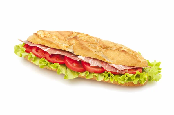 Sandwich of sausage with lettuce and tomato — Stock Photo, Image