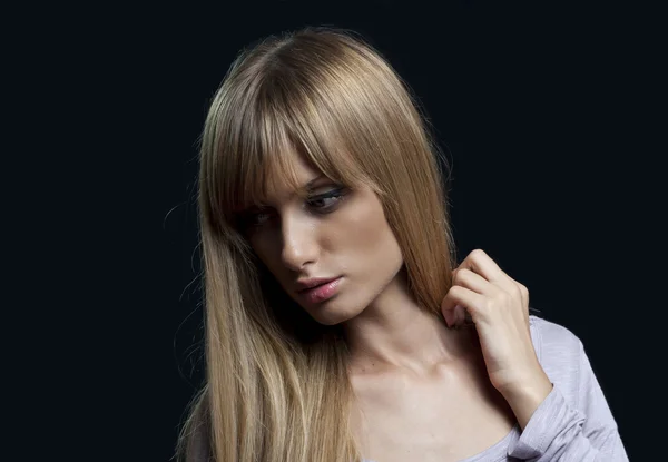 A portrait of a young blonde woman — Stock Photo, Image