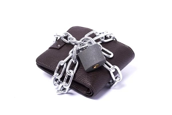 Dark brown wallet with chain and padlock wrapped around the clos Royalty Free Stock Photos