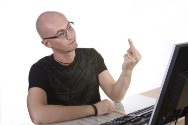 Man shows his middle finger to monitor clipart