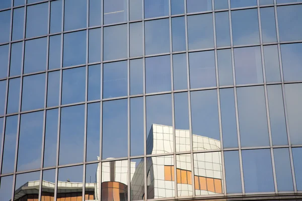 stock image Office building with windows and sky