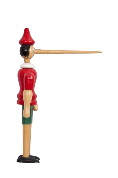 Wooden Pinocchio doll with long nose — Stock Photo, Image