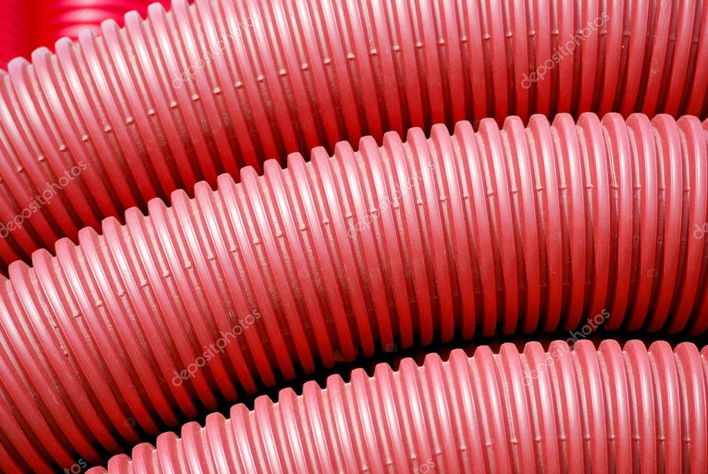 Red plastic tubes — Stock Photo © alfonsodetomas 7009444
