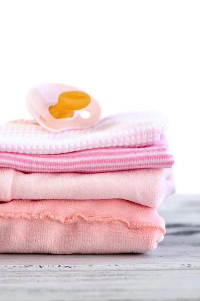 Ropa de bebé rosa — Foto de Stock