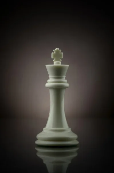 Black king chess piece near pawn — Stock Photo © feedough #74186935