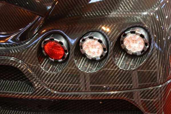 Carbon-fibre car rear lights — Stock Photo, Image
