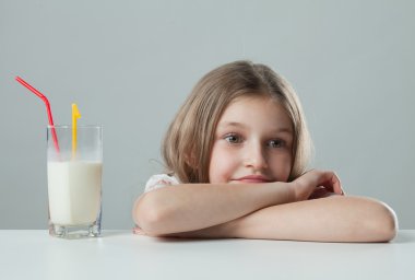 Little girl with a cocktail thought clipart