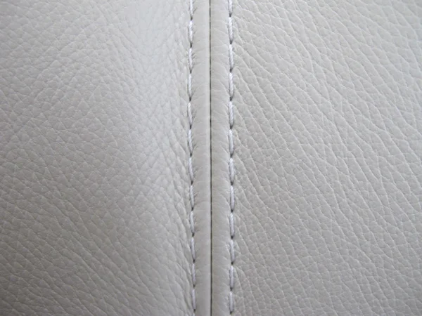 Weißes Leder mit Naht Hintergrund — Stockfoto